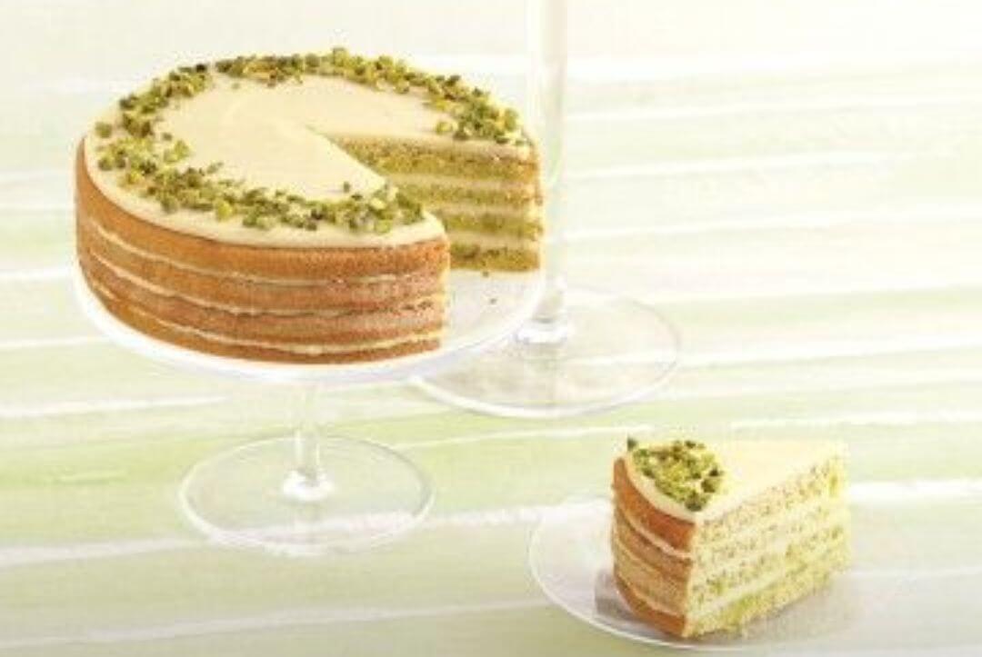 Eggless pistachio Naked cheese Cream cake.